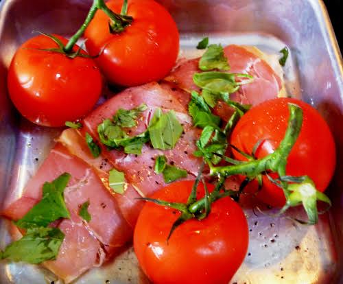 Roast cod with vine tomatoes