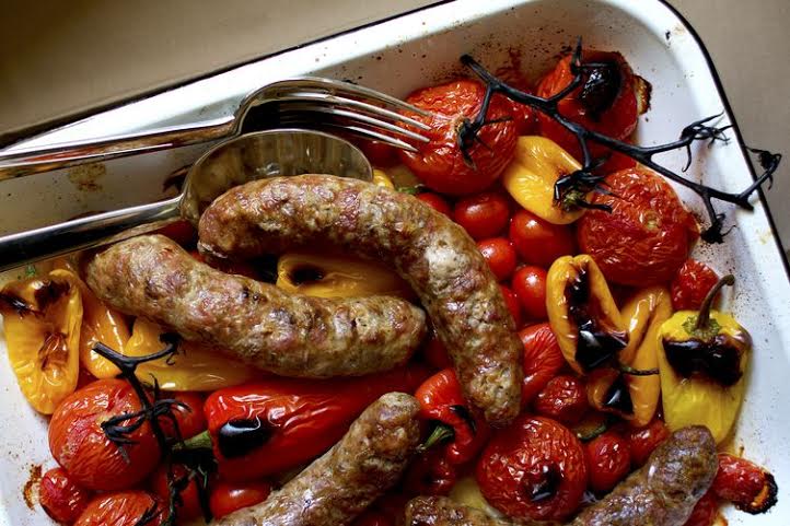 Sausage with vine tomatoes